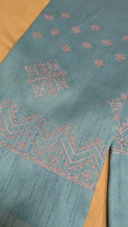 Sky blue kasuti blouse front view with traditional embroidered motifs